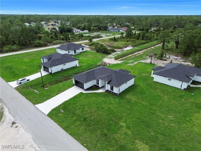 643 Knapp St, Lehigh Acres, FL 33974 - bird's eye view of a heavily wooded area