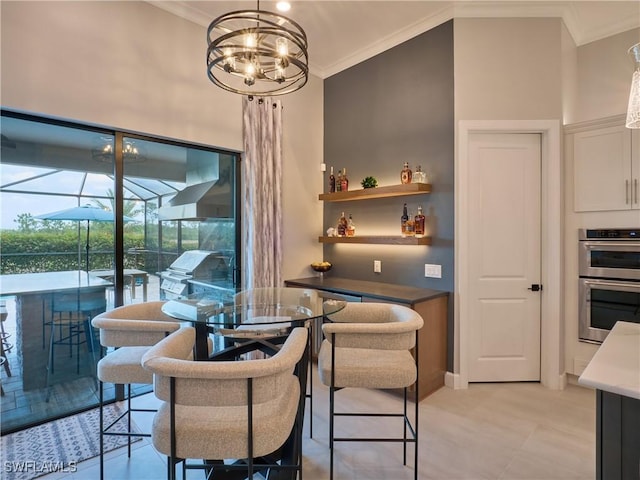 19449 The Place Blvd, Estero, FL 33928 - dining area with ornamental molding and a chandelier