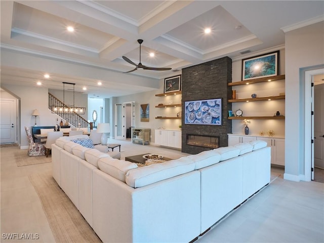 19449 The Place Blvd, Estero, FL 33928 - living room featuring a fireplace, a ceiling fan, beam ceiling, coffered ceiling, and crown molding