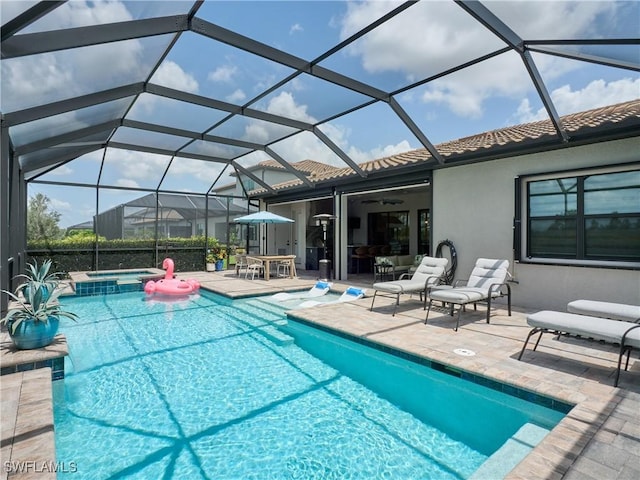 19449 The Place Blvd, Estero, FL 33928 - view of pool featuring a pool with connected hot tub, a patio area, ceiling fan, and a lanai