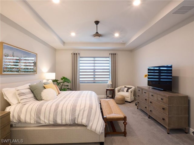 19449 The Place Blvd, Estero, FL 33928 - bedroom with a tray ceiling, light colored carpet, and recessed lighting