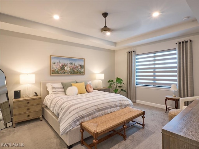 19449 The Place Blvd, Estero, FL 33928 - bedroom featuring light colored carpet, baseboards, a raised ceiling, recessed lighting, and a ceiling fan