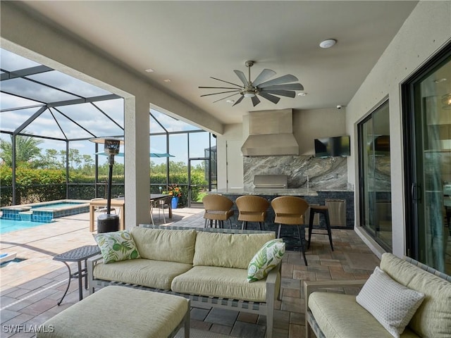19449 The Place Blvd, Estero, FL 33928 - view of patio / terrace featuring outdoor lounge area, a bar, ceiling fan, glass enclosure, and a grill