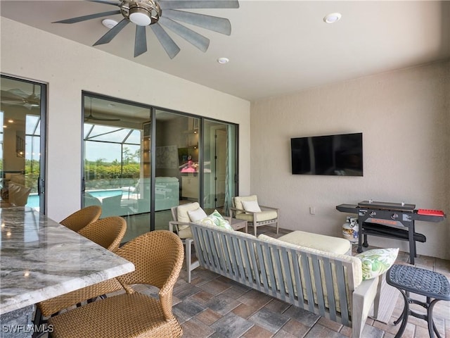 19449 The Place Blvd, Estero, FL 33928 - view of patio with a ceiling fan, outdoor dining area, outdoor lounge area, and an outdoor pool