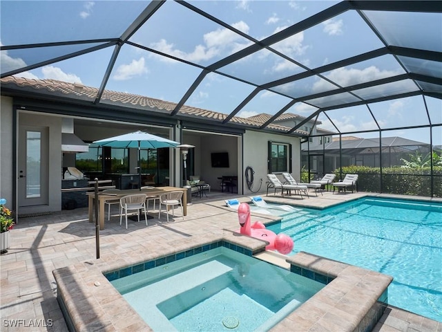 19449 The Place Blvd, Estero, FL 33928 - view of pool featuring a patio, a pool with connected hot tub, area for grilling, and a lanai