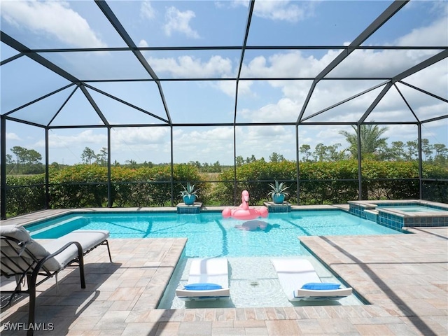 19449 The Place Blvd, Estero, FL 33928 - view of swimming pool with a pool with connected hot tub, a lanai, and a patio