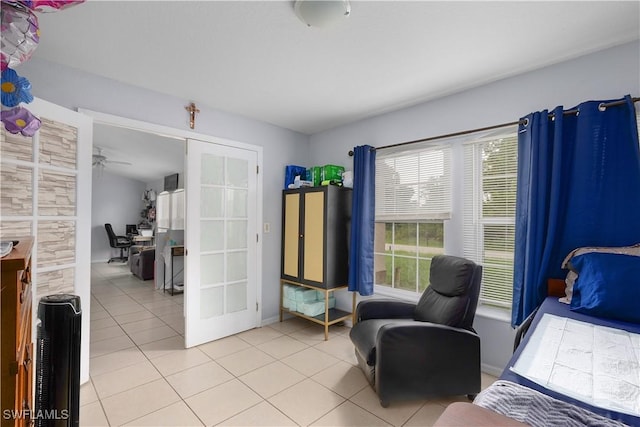 866 Carbon St E, Lehigh Acres, FL 33974 - bedroom with light tile patterned floors