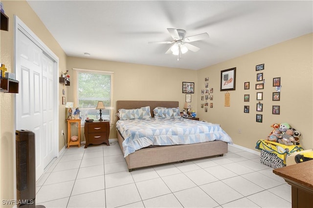 866 Carbon St E, Lehigh Acres, FL 33974 - bedroom featuring a closet, light tile patterned floors, baseboards, and a ceiling fan