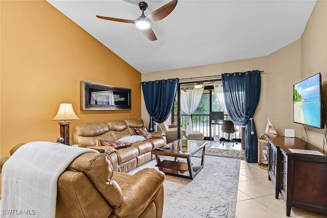 16276 Nautical Way Unit 1402, Bokeelia, FL 33922 - living area featuring vaulted ceiling, ceiling fan, and light tile patterned floors