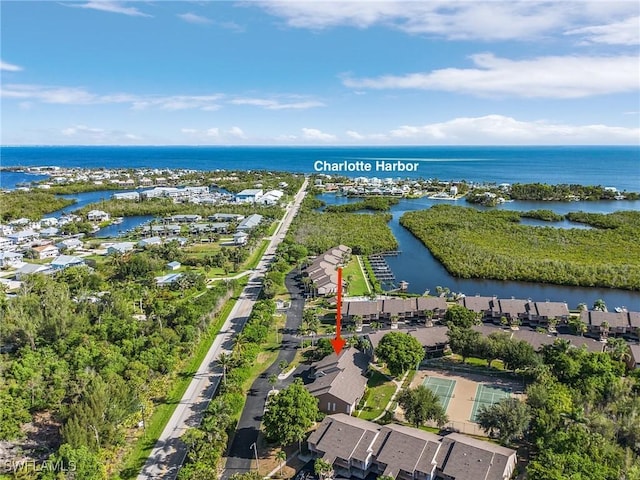 16276 Nautical Way Unit 1402, Bokeelia, FL 33922 - aerial view of property and surrounding area with a large body of water and nearby suburban area