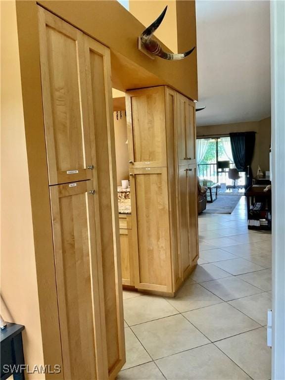 16276 Nautical Way Unit 1402, Bokeelia, FL 33922 - corridor with light tile patterned floors