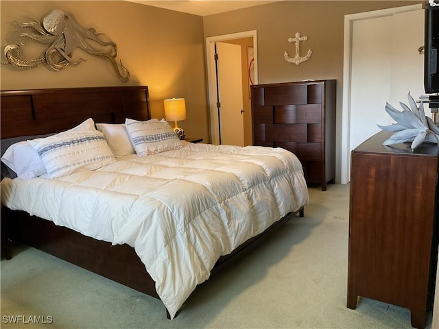 16276 Nautical Way Unit 1402, Bokeelia, FL 33922 - bedroom with light carpet