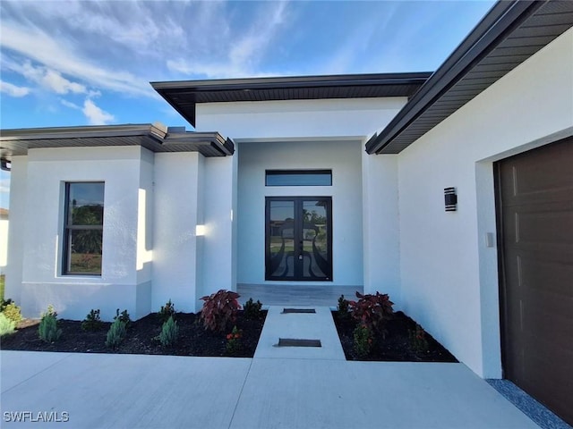 4956 30th Pl SW, Naples, FL 34116 - entrance to property with stucco siding and french doors
