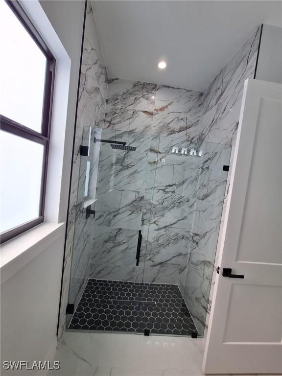4956 30th Pl SW, Naples, FL 34116 - full bath featuring a marble finish shower, recessed lighting, and marble finish floors