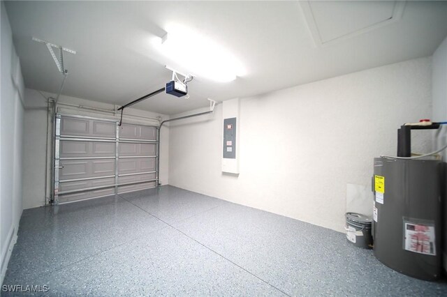 856 Chezy St E, Lehigh Acres, FL 33974 - garage featuring water heater, electric panel, and a garage door opener