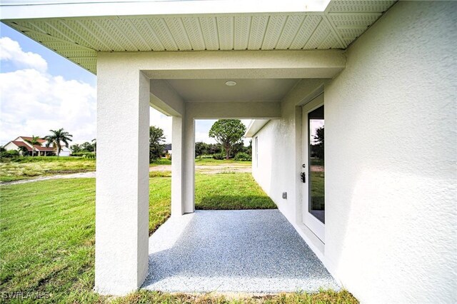 856 Chezy St E, Lehigh Acres, FL 33974 - view of patio / terrace