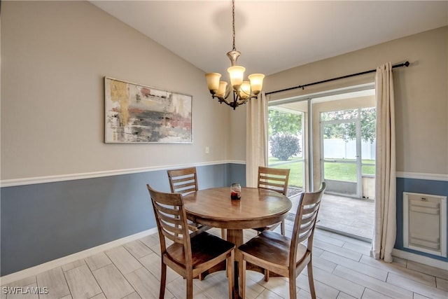 1719 Academy Blvd, Cape Coral, FL 33990 - dining space with a chandelier and lofted ceiling