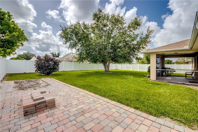 1719 Academy Blvd, Cape Coral, FL 33990 - view of yard with a patio