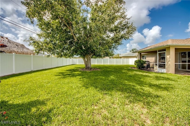 1719 Academy Blvd, Cape Coral, FL 33990 - view of yard with a sunroom