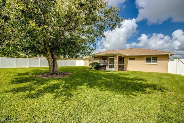 1719 Academy Blvd, Cape Coral, FL 33990 - view of yard with a sunroom