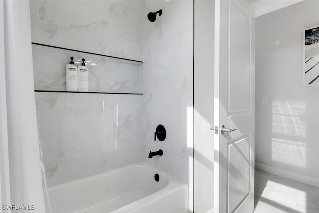 4119 43rd Ave NE, Naples, FL 34120 - bathroom with washtub / shower combination and baseboards
