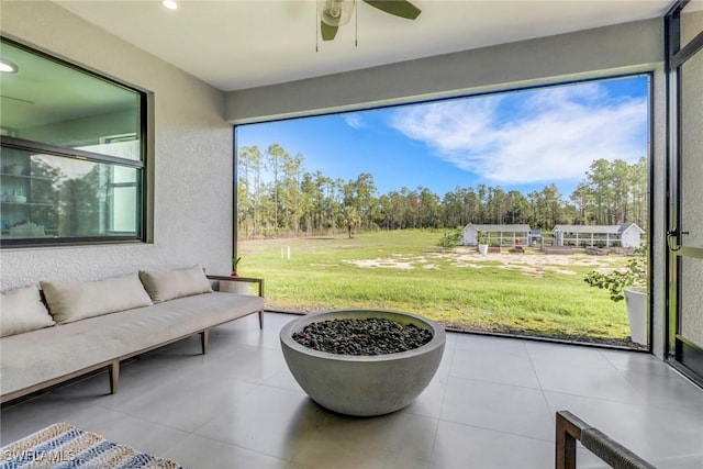 4119 43rd Ave NE, Naples, FL 34120 - view of patio / terrace featuring outdoor lounge area and ceiling fan