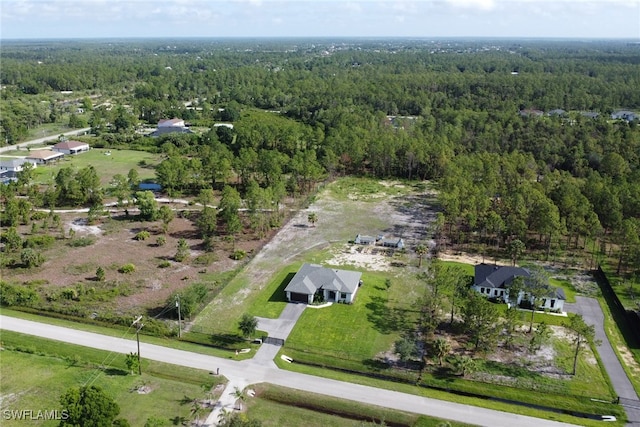 4119 43rd Ave NE, Naples, FL 34120 - view of property location with a heavily wooded area