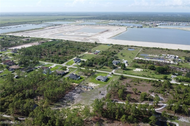 4119 43rd Ave NE, Naples, FL 34120 - aerial view of property and surrounding area featuring a large body of water