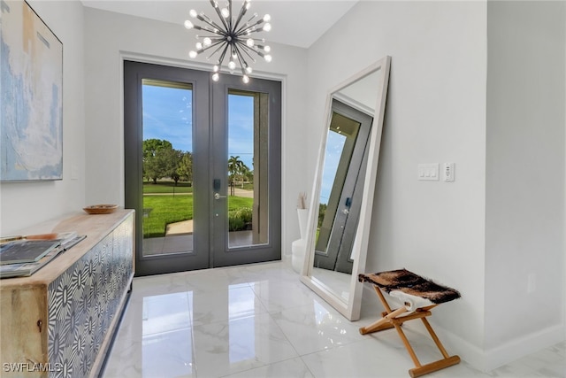 4119 43rd Ave NE, Naples, FL 34120 - doorway featuring french doors, a chandelier, and marble finish flooring