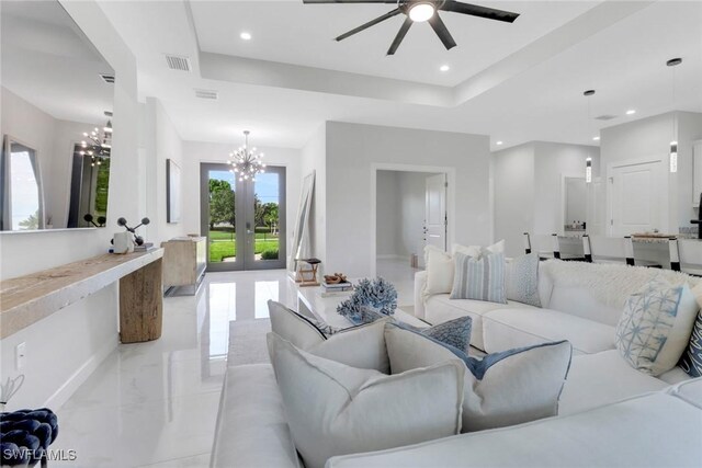 4119 43rd Ave NE, Naples, FL 34120 - living room featuring a chandelier, a ceiling fan, light marble finish floors, recessed lighting, and french doors