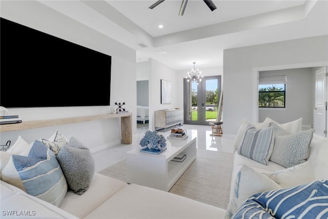 4119 43rd Ave NE, Naples, FL 34120 - living area with a chandelier, recessed lighting, a raised ceiling, and ceiling fan