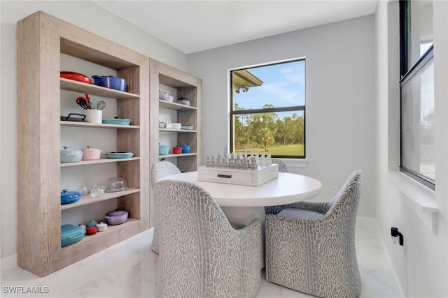 4119 43rd Ave NE, Naples, FL 34120 - dining space featuring plenty of natural light