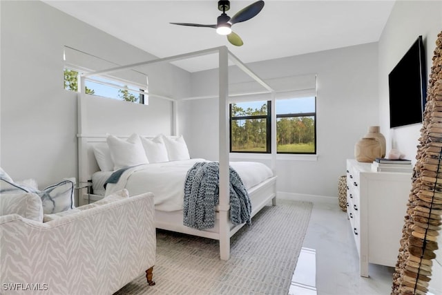 4119 43rd Ave NE, Naples, FL 34120 - bedroom featuring multiple windows and a ceiling fan