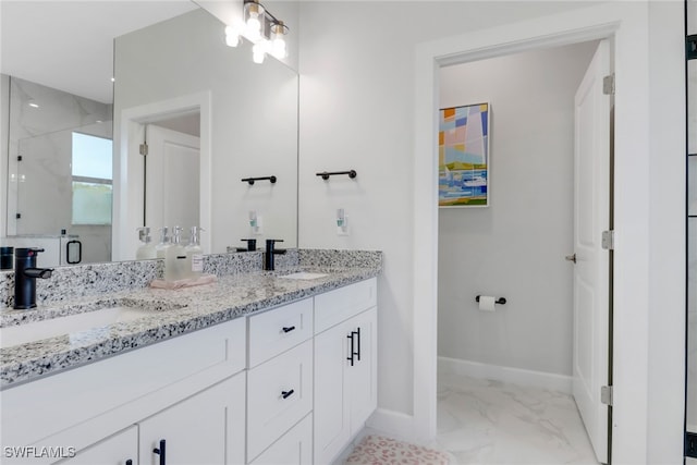 4119 43rd Ave NE, Naples, FL 34120 - bathroom with marble finish flooring, double vanity, and a marble finish shower