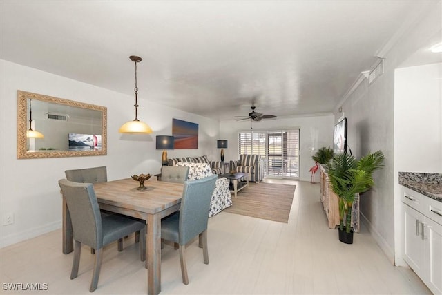12541 Kelly Sands Way Unit 19, Fort Myers, FL 33908 - dining area with ceiling fan and baseboards