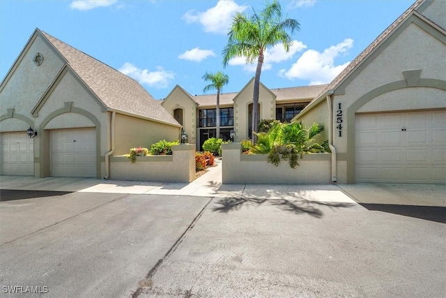 12541 Kelly Sands Way Unit 19, Fort Myers, FL 33908 - ranch-style home featuring stucco siding and an attached garage