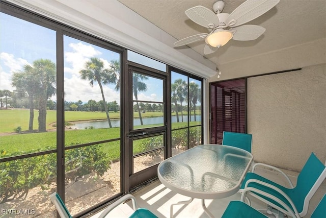12541 Kelly Sands Way Unit 19, Fort Myers, FL 33908 - sunroom with a water view, plenty of natural light, and a ceiling fan