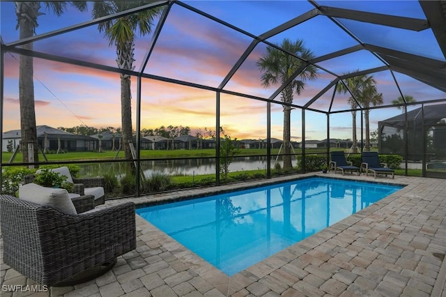 1870 Amador Ct, Naples, FL 34120 - swimming pool with a patio area, a water view, and a lanai