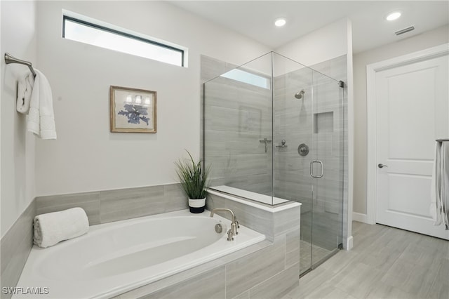 1870 Amador Ct, Naples, FL 34120 - bathroom featuring a bath and a shower stall