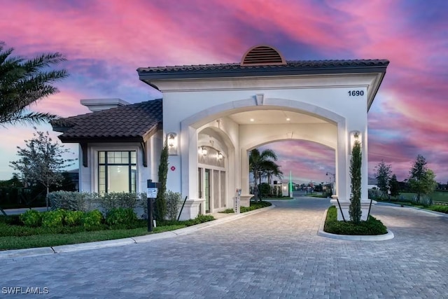 1870 Amador Ct, Naples, FL 34120 - view of community featuring curved driveway