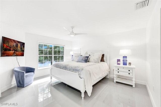 4150 Lake Forest Dr Unit 1322, Bonita Springs, FL 34134 - bedroom featuring ceiling fan and light tile patterned flooring
