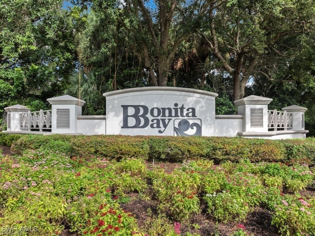 4150 Lake Forest Dr Unit 1322, Bonita Springs, FL 34134 - community / neighborhood sign with view of scattered trees