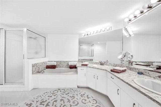 4150 Lake Forest Dr Unit 1322, Bonita Springs, FL 34134 - full bath with a shower stall, double vanity, a garden tub, and tile patterned flooring