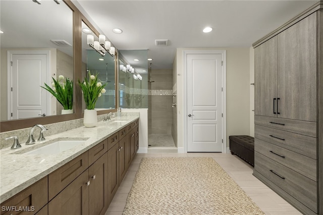 16382 Viansa Way Unit 3-202, Naples, FL 34110 - full bath featuring double vanity, a shower stall, and recessed lighting