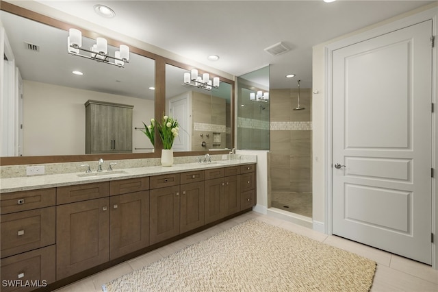 16382 Viansa Way Unit 3-202, Naples, FL 34110 - full bath featuring a shower stall, double vanity, tile patterned flooring, and recessed lighting