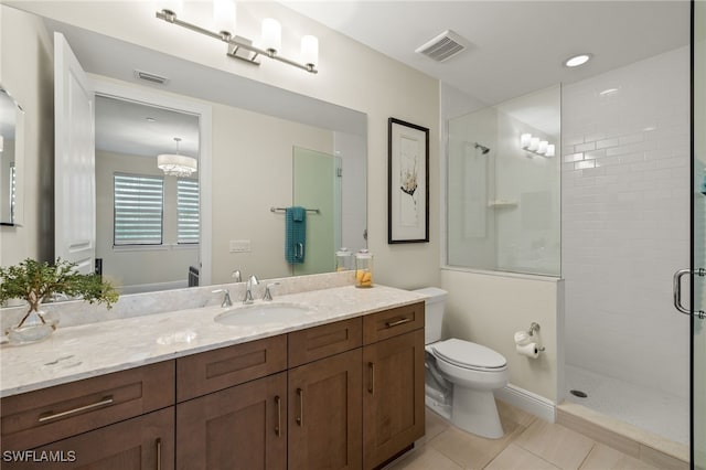 16382 Viansa Way Unit 3-202, Naples, FL 34110 - full bathroom with a stall shower, vanity, toilet, and tile patterned flooring