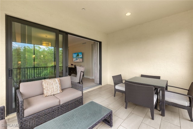 16382 Viansa Way Unit 3-202, Naples, FL 34110 - sunroom with outdoor lounge area