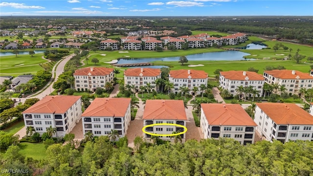 16382 Viansa Way Unit 3-202, Naples, FL 34110 - bird's eye view of apartment complex / building, a golf club, and a large body of water