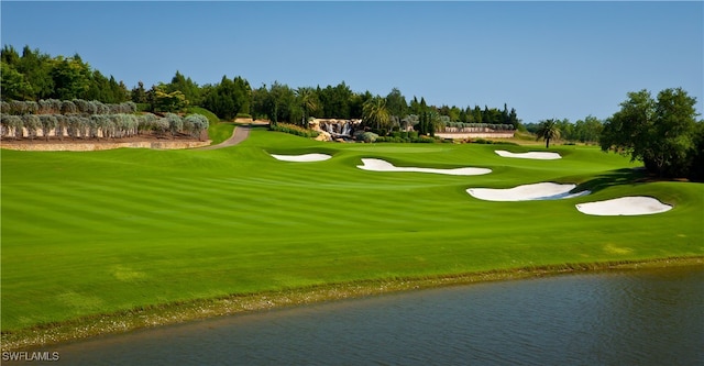 16382 Viansa Way Unit 3-202, Naples, FL 34110 - view of community featuring golf course view, a water view, and view of scattered trees
