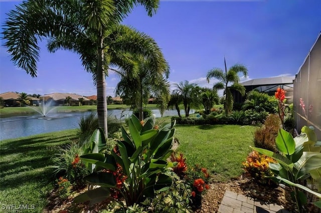 11177 Monte Carlo Blvd, Bonita Springs, FL 34135 - view of green lawn featuring a water view